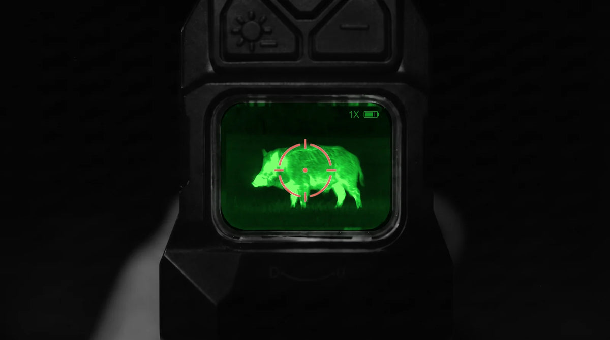Illustration: view through the HYBRID at night in White Hot, a hog glows bright green under the red circle